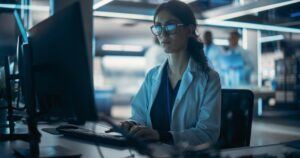 researcher at her computer